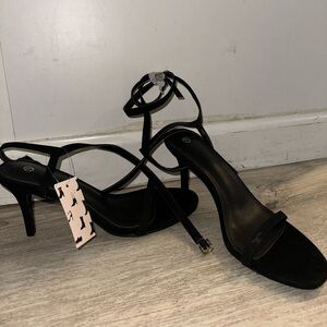 Brand New Small Black Heel
